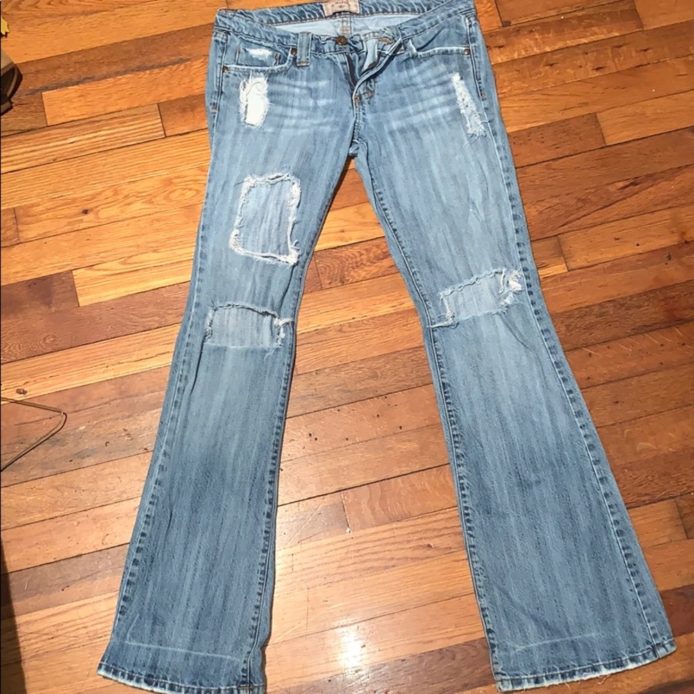 Destroyed/ distressed flared jeans